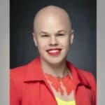 Bajdenov zvaničnik fluidog rodnog identiteta iz Ministarstva energetike optužen za krađu nakon što je lagao policajce